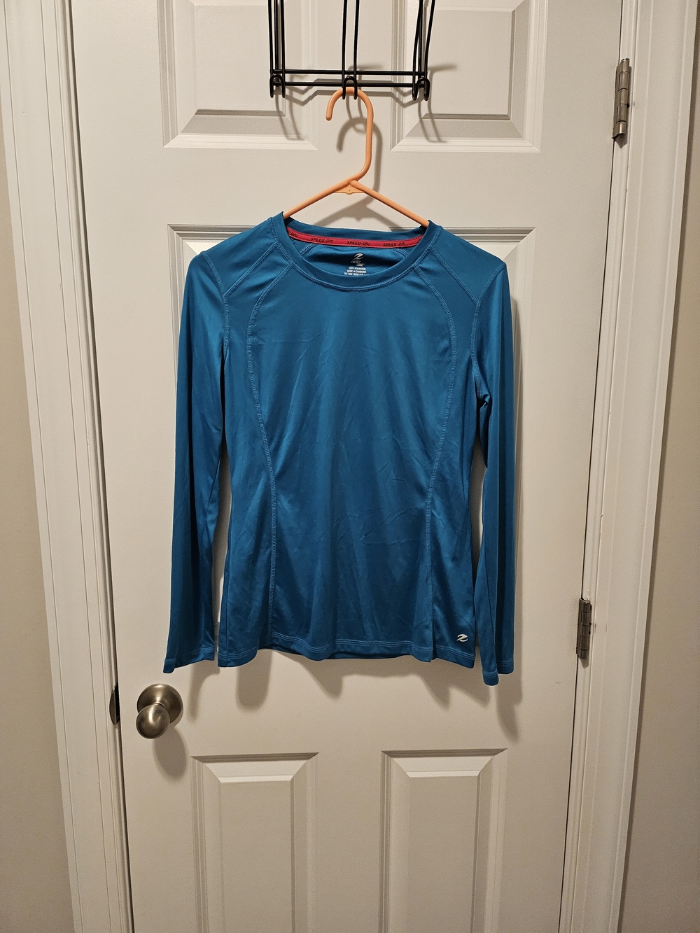 Energy Zone Women's Long-Sleeve Performance Tee in Teal Blue